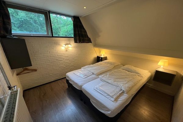 Slaapkamer - Charmant vakantiehuis met wifi in Stramproy (1)