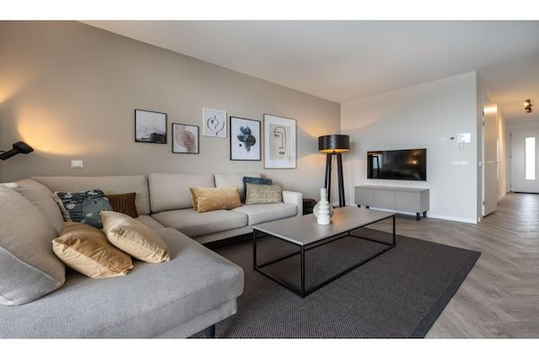 Woonkamer - Loftappartement bij Veerse Meer Marina in Kamperland (2)