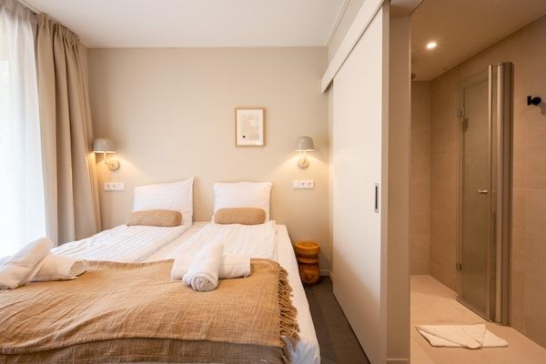 Slaapkamer - Vakantiehuis in Bos met Sterrendak in Zeewolde (4)