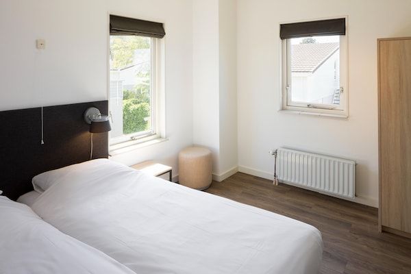 Slaapkamer - Vakantiehuis met sauna vlakbij het strand in Kamperland (4)