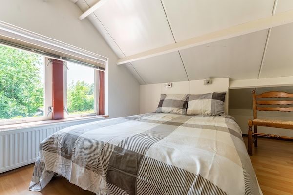 Slaapkamer - Vakantiehuis Zeeland bij Westerschelde in Baarland (5)