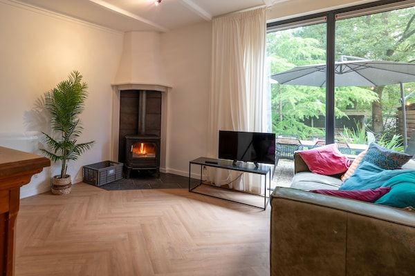 Woonkamer - Vakantiehuis in Zelhem bij bos en golfbaan in Zelhem (3)
