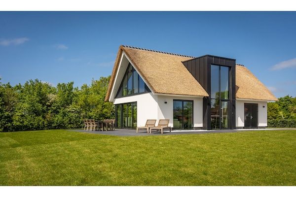 Buitenkant - Villa op Texel bij Vuurtoren Waddenzee in De Cocksdorp (1)