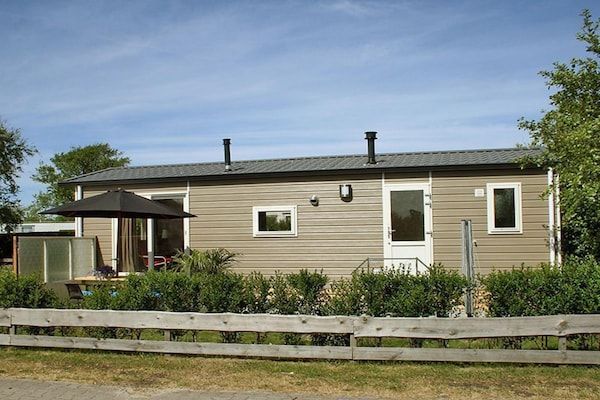 Buitenkant - Mooi chalet tussen golfbaan en strand in Hollum (1)