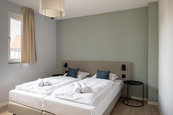 Slaapkamer - Familievilla aan het strand in Nieuwvliet (3)