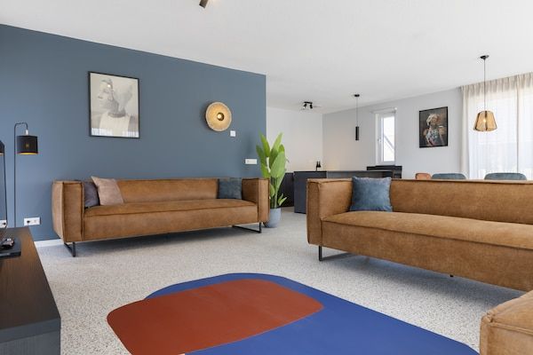 Woonkamer - Vakantiehuis in een vakantiepark in Nieuwvliet (2)