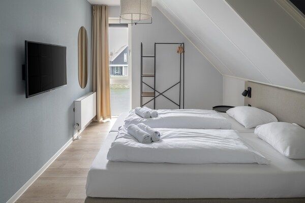 Slaapkamer - Vakantiehuis in Nieuwvliet-Bad bij Strand in Nieuwvliet (3)