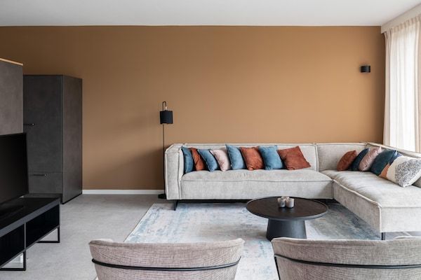 Woonkamer - Luxe woning in Nieuwvliet-Bad met zwembad in Nieuwvliet (3)