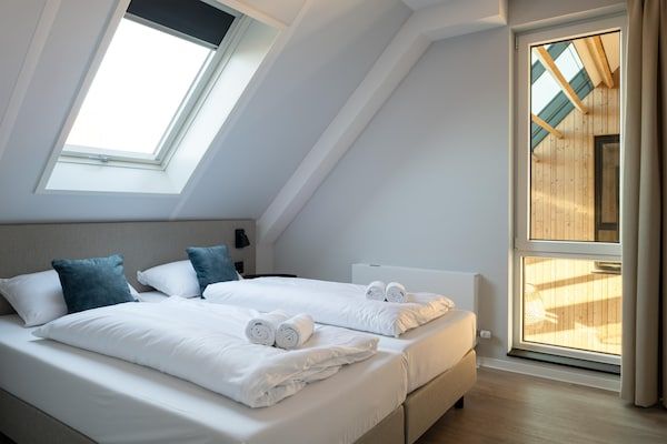 Slaapkamer - Vakantiehuis in Nieuwvliet-Bad bij Strand in Nieuwvliet (4)
