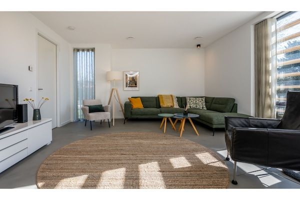 Woonkamer - Vakantiehuis bij Veerse Meer met tuin in Kamperland (4)