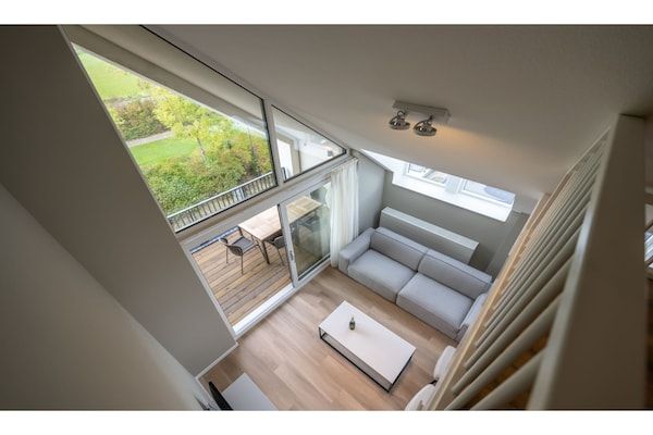 Woonkamer - Stijlvolle Marina Loft met balkon in Kamperland (2)
