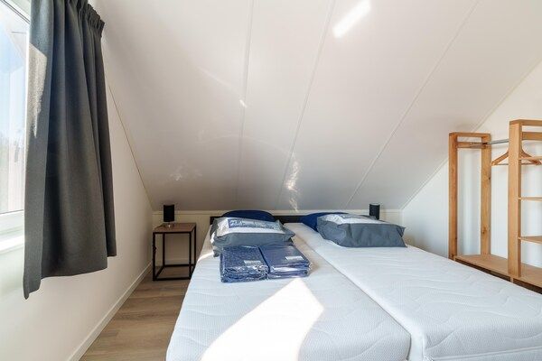 Slaapkamer - Mooi vakantiehuis met sauna nabij Rotterdam in Simonshaven (4)