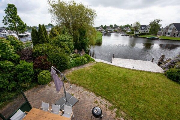 Tuin - Vakantie-uitje met een privé-aanlegsteiger in Terherne (3)