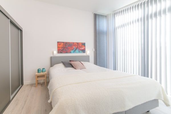 Slaapkamer - Huis in Zeeland met terras bij de dijk in Wemeldinge (3)