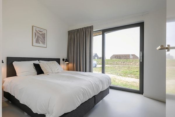 Slaapkamer - Vakantiehuis Wissenkerke bij Banjaardstrand in Wissenkerke (5)