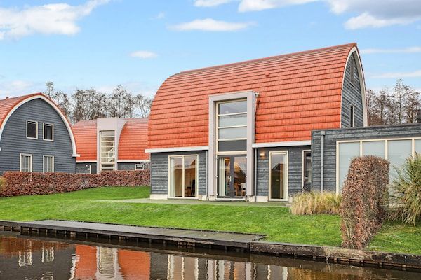 Buitenkant - Villa met sauna aan het meer in Midlaren (1)