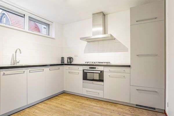 Keuken - Villa met sauna aan het meer in Midlaren (5)