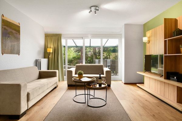 Woonkamer - Vakantiehuis in Brabant met Tuin & BBQ in Diessen-Baarschot (3)