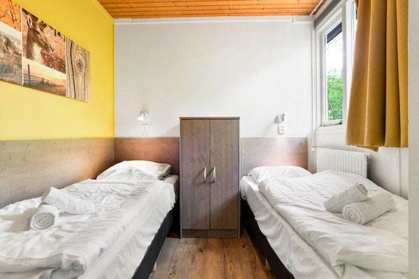Slaapkamer - Bungalow in Putten bij Veluwebos in Putten (5)