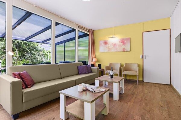 Woonkamer - Bungalow in Putten bij Veluwe Bossen in Putten (3)
