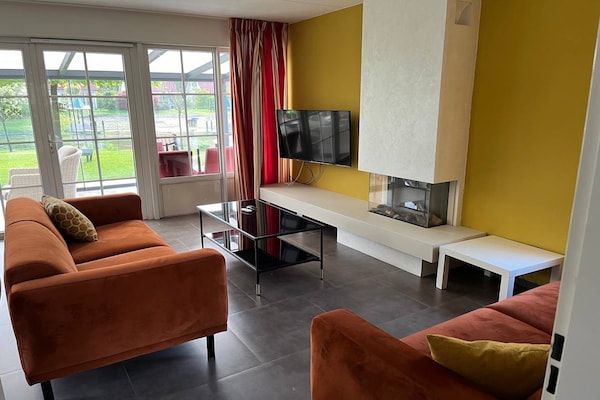 Woonkamer - Vakantiehuis in Hellendoorn bij bos in Hellendoorn (3)