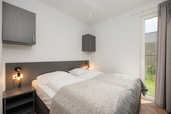 Slaapkamer - Natuurlodge met eigen tuin in Zuna (4)