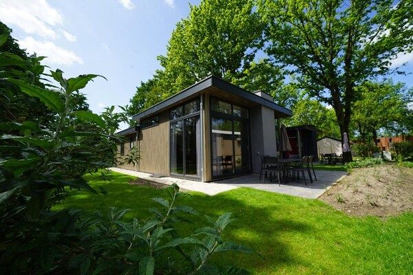 Buitenkant - Gezellig chalet vlakbij het safaripark. in Kaatsheuvel (1)