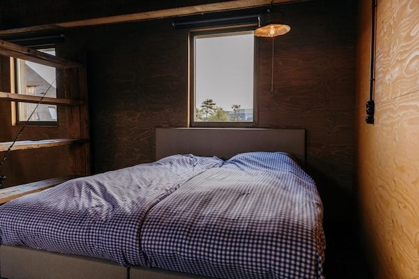 Slaapkamer - Rustieke strandvakantie met fietsen in Callantsoog (5)