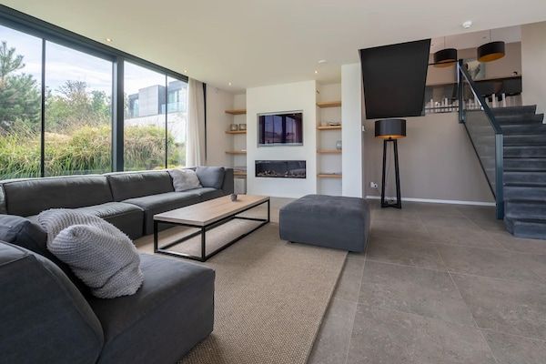 Woonkamer - Villa aan het water voor 8 personen in Arnemuiden (2)