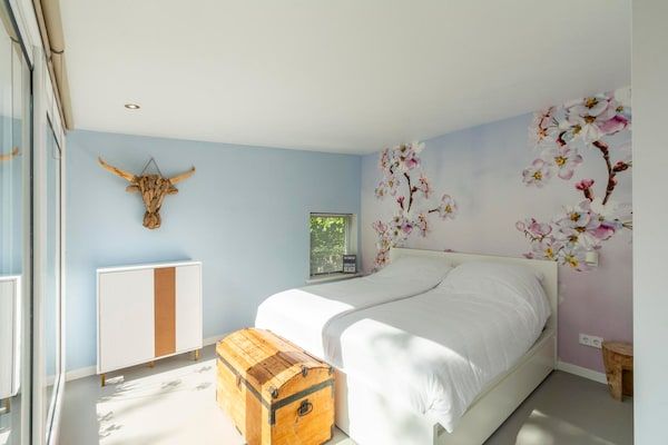 Slaapkamer - Bungalow in Sint Maartenszee met Tuinzicht in Sint Maartenszee (4)