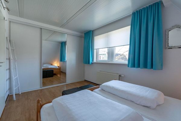 Slaapkamer - Vakantiehuis St. Maartenszee bij Strand in Sint Maartenszee (4)