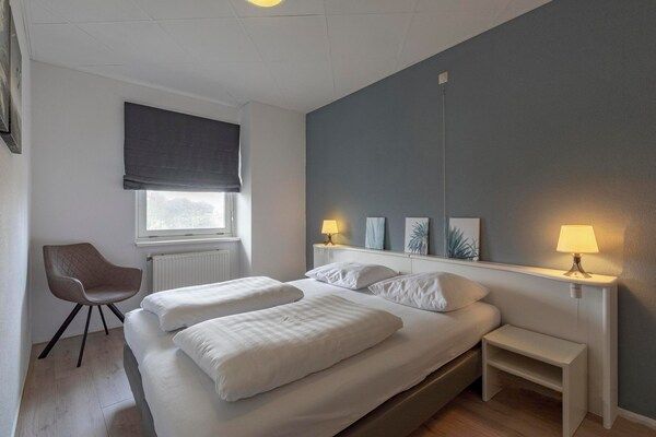 Slaapkamer - Stranduitje met terras in Julianadorp aan Zee (3)