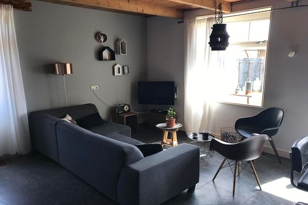Woonkamer - Appartement met tuin in Nederlands landschap in Callantsoog (1)