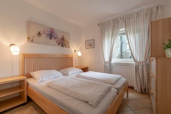 Slaapkamer - Appartement aan de kust met duinzicht in Callantsoog (2)
