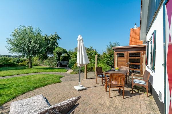 Terras - De Buitenplaats 7 villa met uitzicht op de duinen in Callantsoog (5)