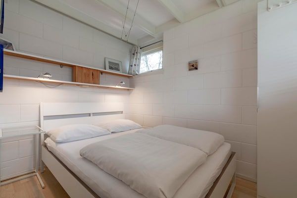 Slaapkamer - Wildrijk 83 vakantiehuis bij het strand in Sint Maartenszee (3)