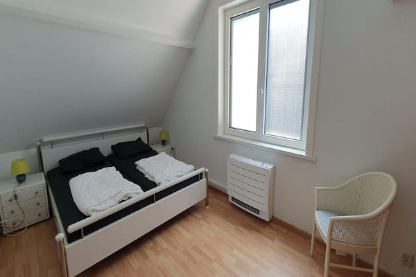 Slaapkamer - Eco-retraite aan zee in Breskens (4)