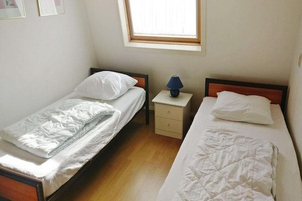 Slaapkamer - Huis in Breskens bij de stranden in Breskens (4)
