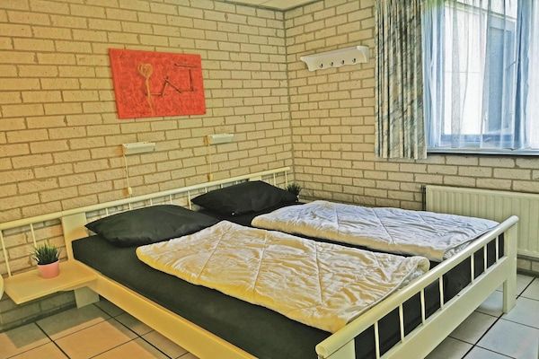 Slaapkamer - Huis in Breskens bij Strand en Vuurtoren in Breskens (4)