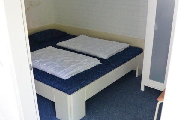 Slaapkamer - Vakantiehuis in Breskens bij het strand in Breskens (4)