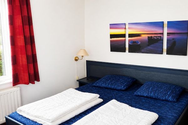 Slaapkamer - Vakantiehuis Breskens bij stranden in Breskens (4)