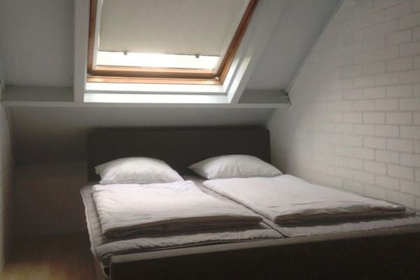 Slaapkamer - Duinrooswoning met terras in Breskens (2)