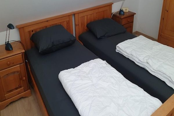 Slaapkamer - Milieuvriendelijk vakantiehuis in Breskens (4)
