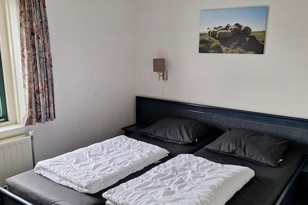 Slaapkamer - Vakantiehuis Breskens bij de kust in Breskens (4)
