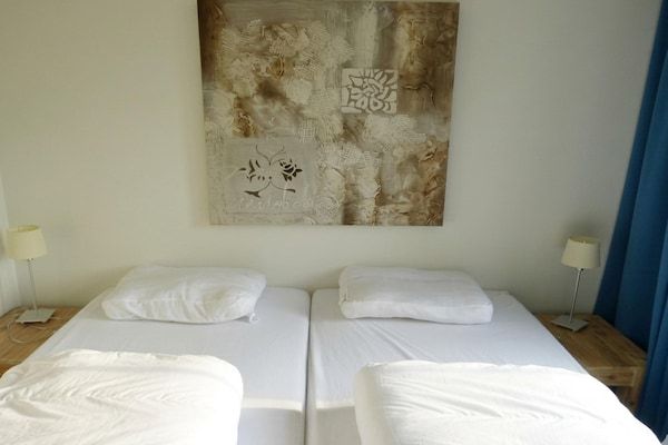 Slaapkamer - Vakantiehuis in Breskens bij Strand in Breskens (4)