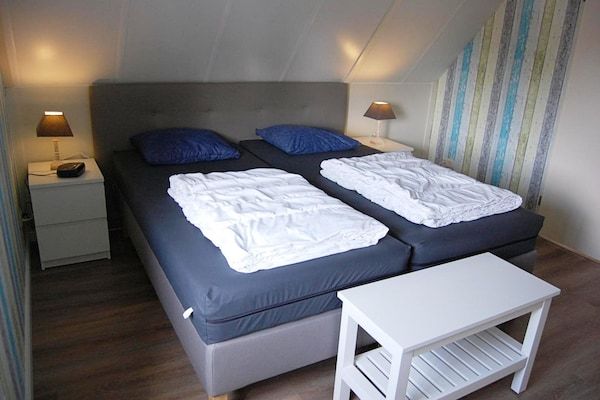 Slaapkamer - Vakantiehuis bij Strand in Schoneveld in Breskens (4)