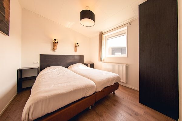 Slaapkamer - Gezellig vakantiehuis met tuin in Slagharen (5)
