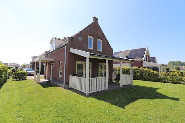 Buitenkant - Bungalow aan het water bij Rotterdam in Simonshaven (3)