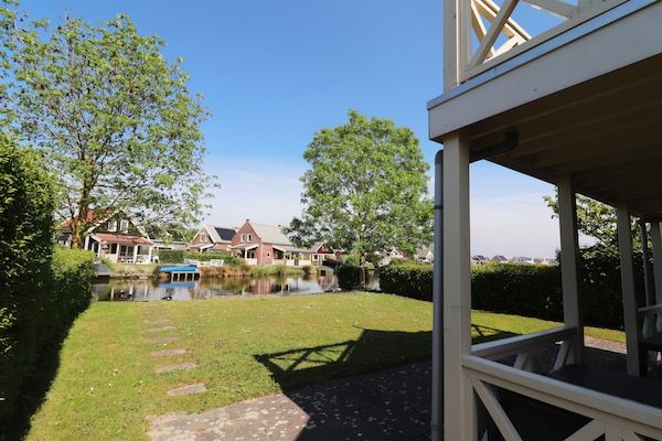 Tuin - Bungalow in Zuid-Holland aan het water in Simonshaven (2)