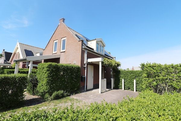 Buitenkant - Bungalow aan het water bij Rotterdam in Simonshaven (3)